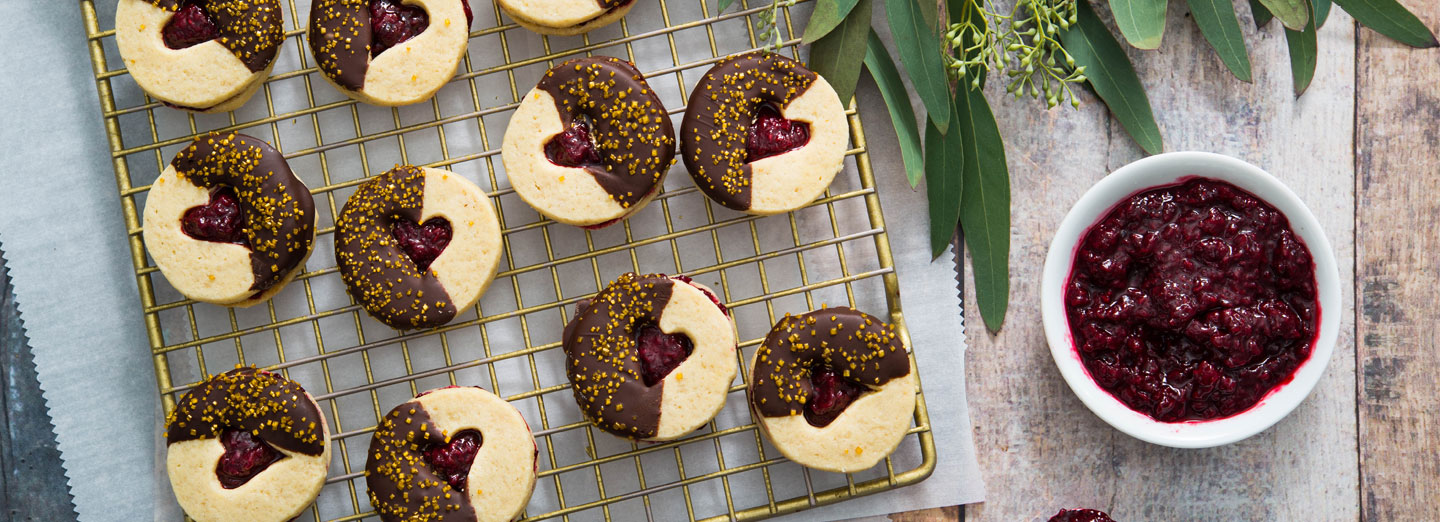Chocolate-Dipped Raspberry Linzer Cookies
