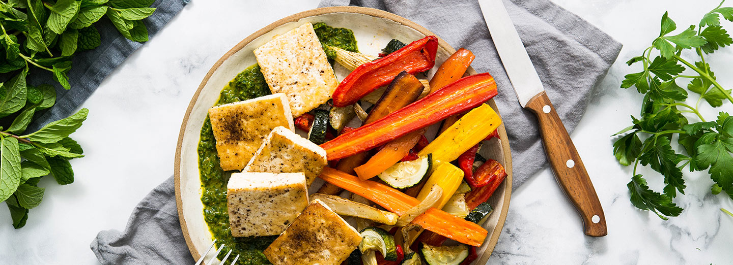 tofu chermoula with vegetables on a plate